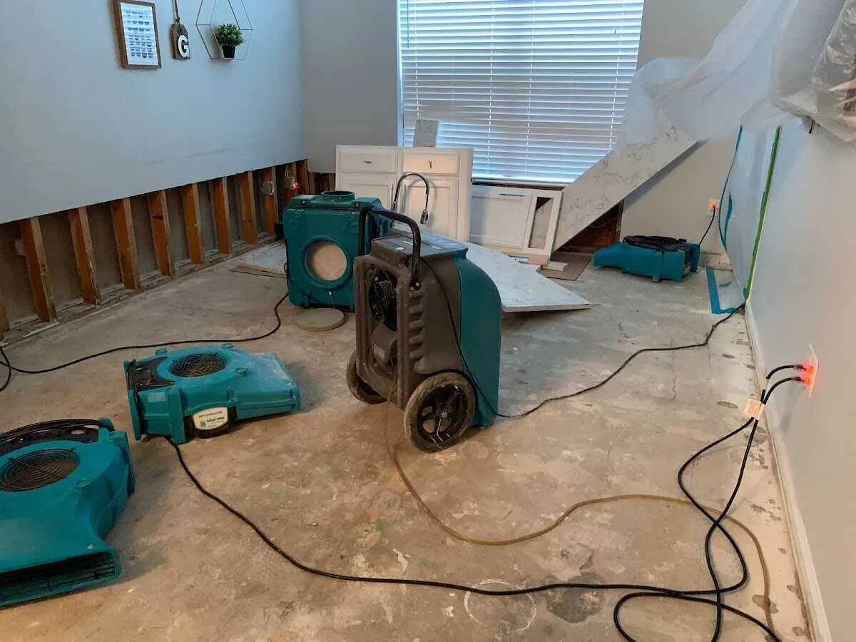 Dehumidifier in flood-cut room for Water Damage Restoration in Schertz